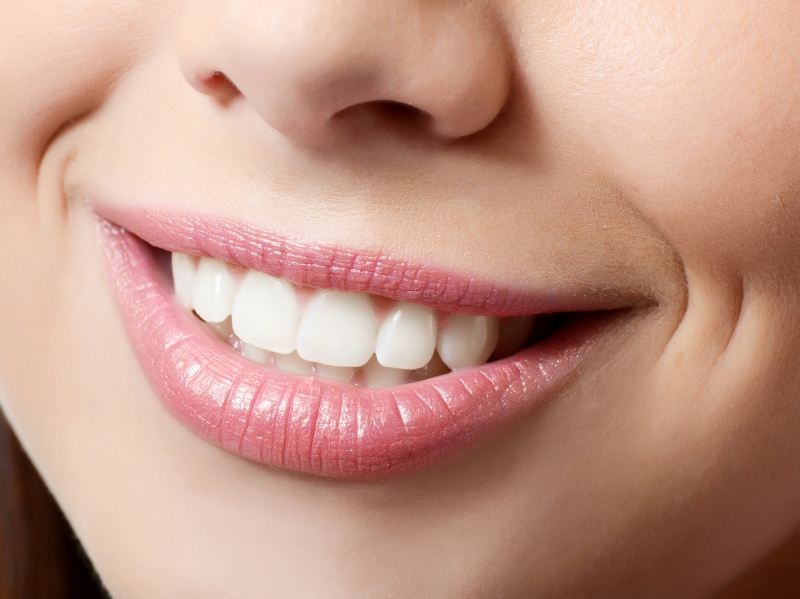 5844011-healthy-woman-teeth-and-smile